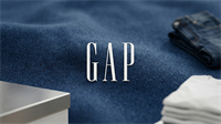 Folded denim and neutral clothing with Gap branding, reflecting apparel retail and AI-driven shopping innovation.