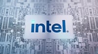 The Intel logo centered on a metallic microchip circuit board.
