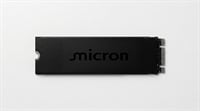A black Micron M.2 SSD on a plain background.