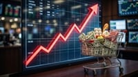 A miniature shopping cart filled with groceries and cash sits in front of a rising red price chart, illustrating the effect of inflation on purchasing power.