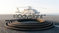 Odysight AI logo overlaid on an image of a coiled cable with a military helicopter in the background.