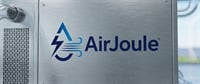 AirJoule logo displayed on a brushed metal panel of an industrial unit.