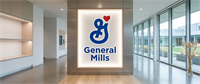 General Mills logo displayed on an illuminated sign in a modern corporate office lobby.