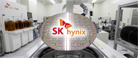 A semiconductor wafer with the SK hynix logo displayed inside a manufacturing fabrication facility.