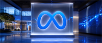 Illuminated Meta logo displayed in a glass case within a modern corporate lobby setting.