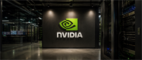 NVIDIA logo displayed on a wall inside a data center with server racks and monitors visible.