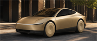 Gold-colored concept electric vehicle with a smooth, minimalist body parked outdoors near a building and tree.