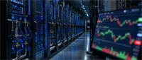 Server racks with blue lighting in a data center, with a candlestick stock price chart displayed on a monitor.
