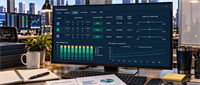 Computer monitor on a desk displaying an equity research dashboard with analyst ratings, price targets, and consensus price target charts.