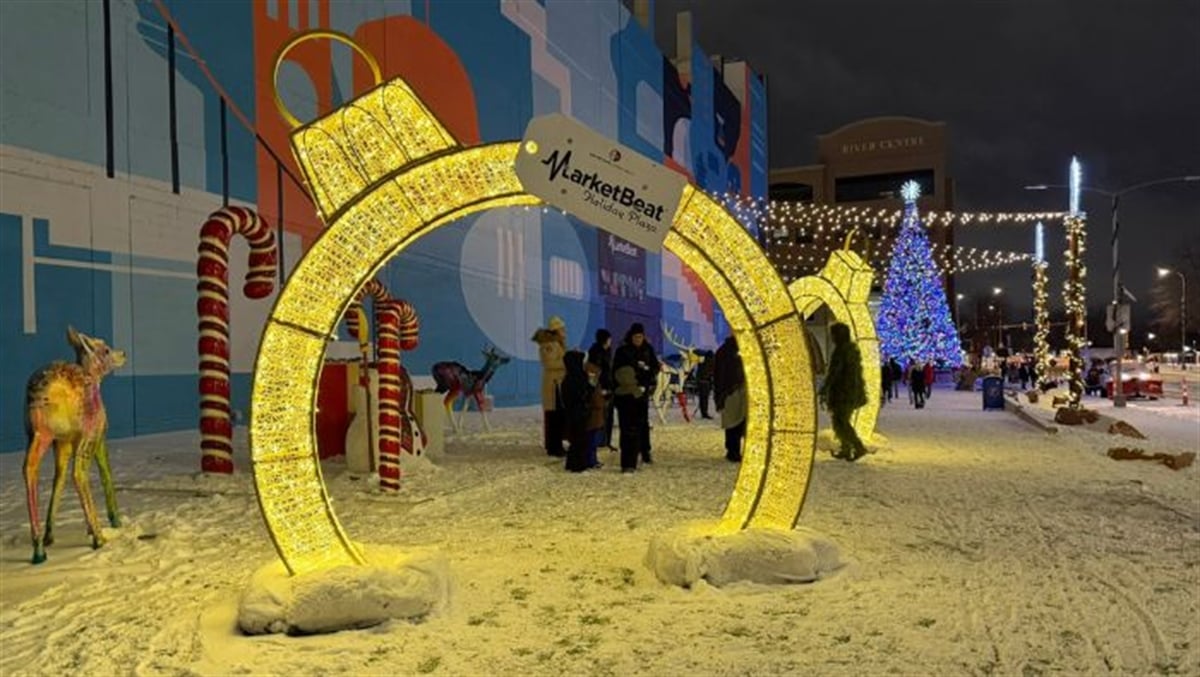 MarketBeat holiday plaza bell arch