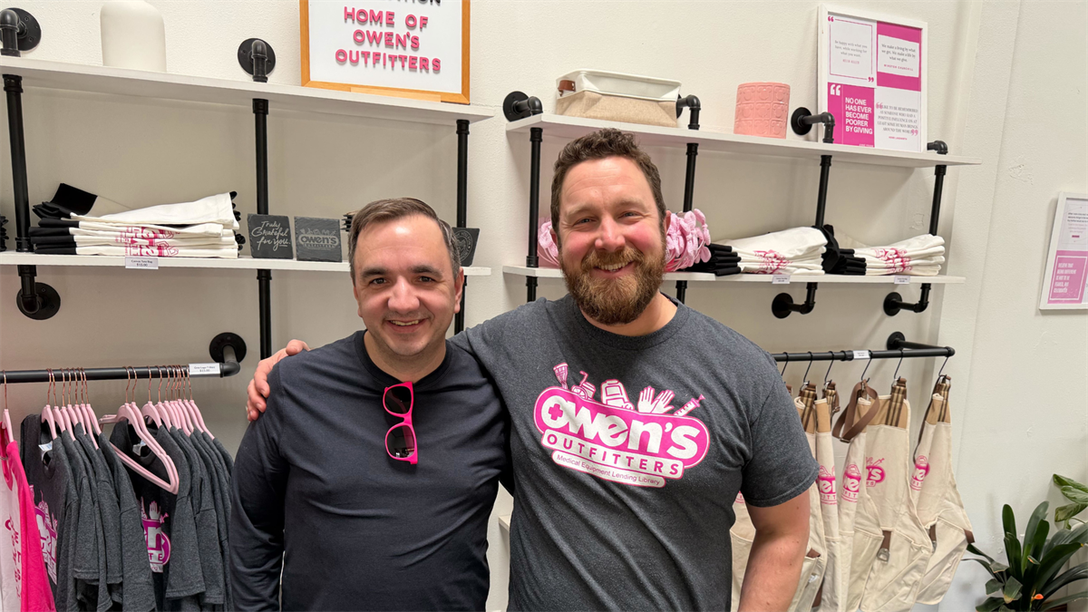 MarketBeat Founder and CEO Matt Paulson with Owen's Outfitters Executive Director Mike Turner.
