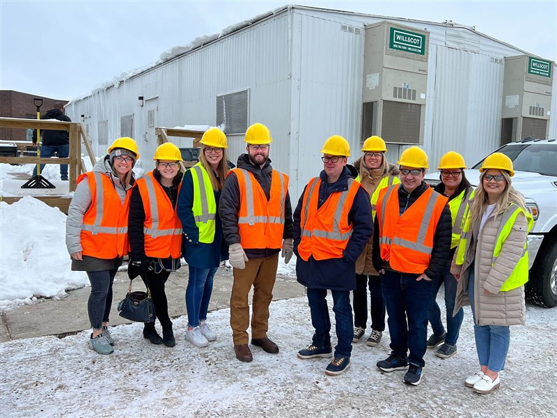 Staff touring construction site 