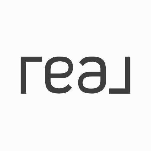 REAX stock logo